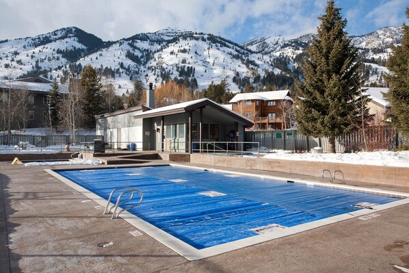 Outdoor pool, a heated pool - Slopeside Family Ski in, ,Wifi, Hot Tub, Pool, Yellowstone, Netflix (Teton Village)
