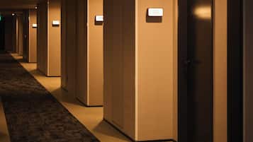 A hotel corridor with doors numbered 337 to 338.