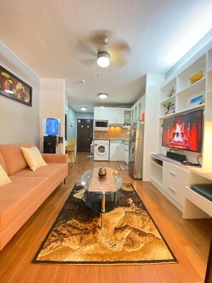 1 Bedroom Condo, Balcony | Living area | 0-inch Smart TV with cable channels, TV, fireplace - 1BR Unit For Rent One Oasis Condominium (Davao)