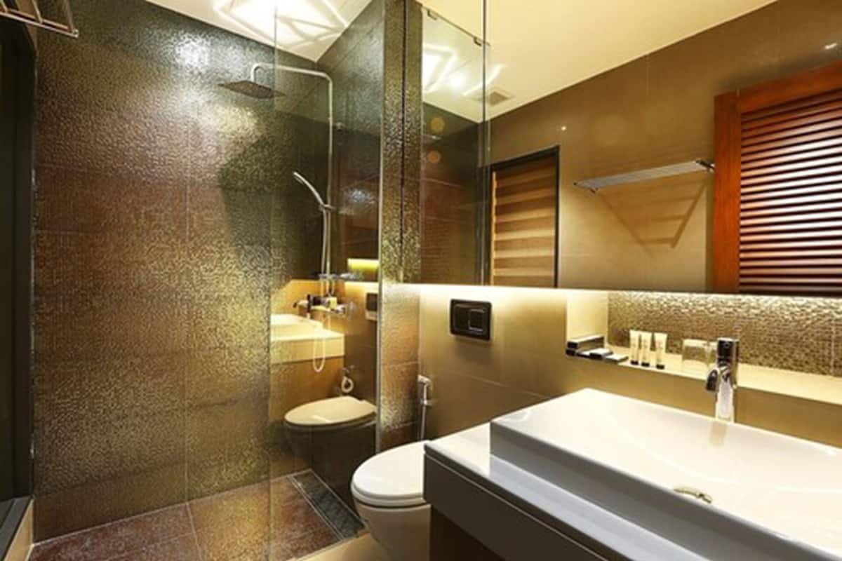 separate bathtub and shower, rainfall showerhead, designer toiletries