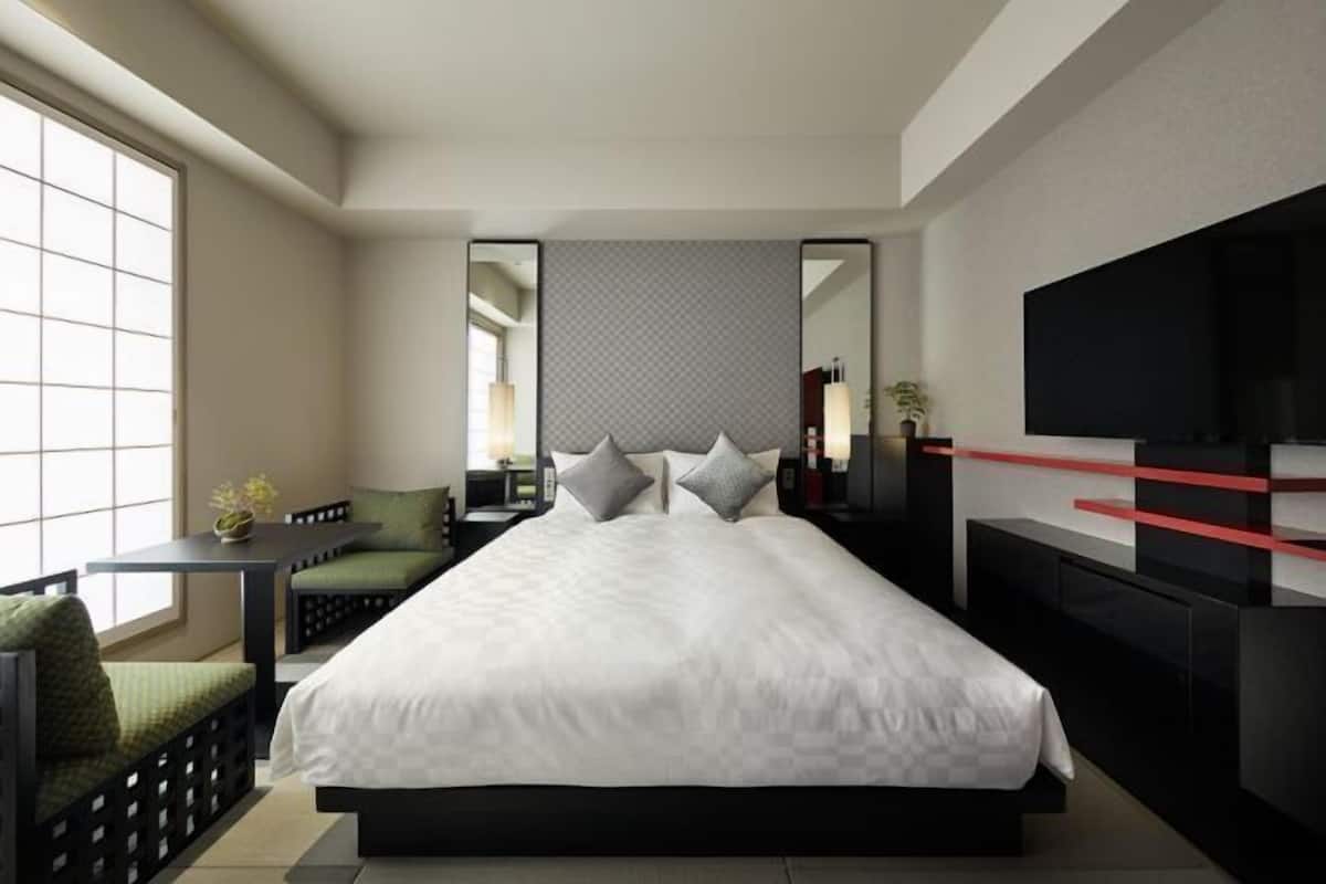 Laptop workspace, blackout curtains, soundproofing, iron/ironing board