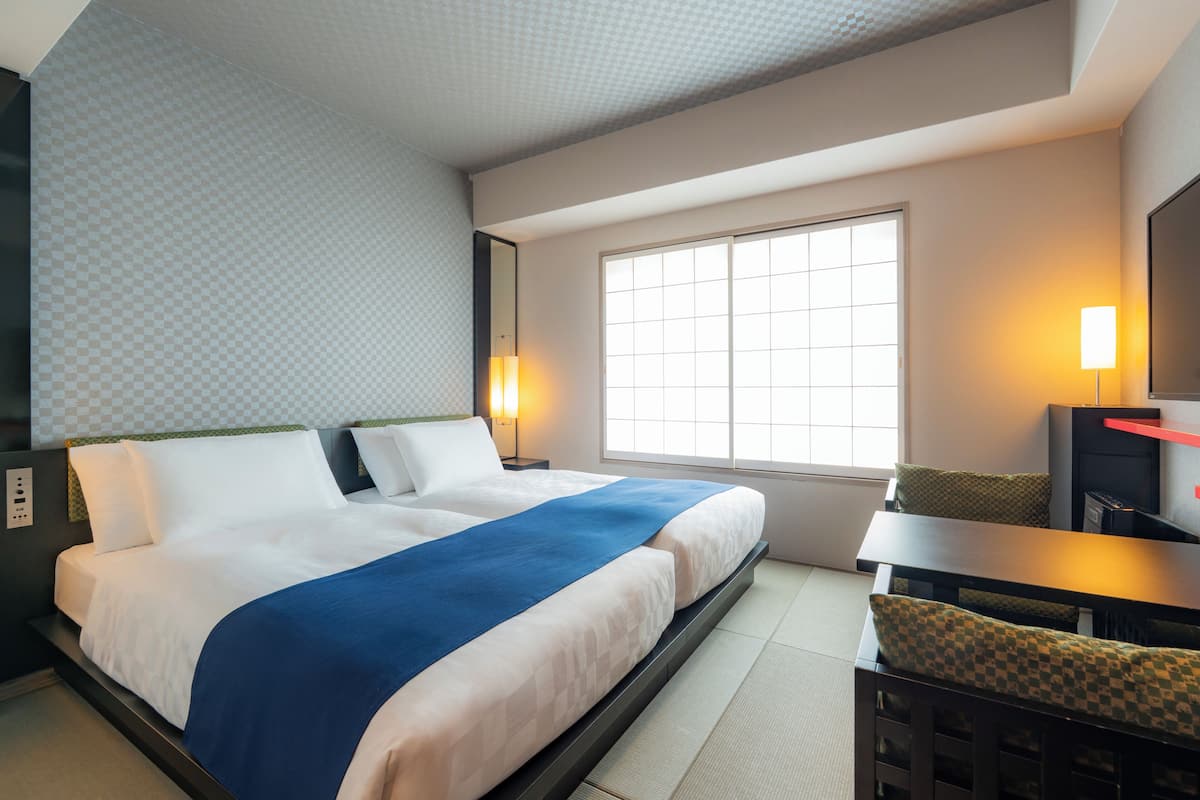 Twin Room | Laptop workspace, blackout curtains, soundproofing