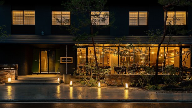A hotel entrance with a sign reading "HOTEL REVL TRINITY". - Hotel Resol Trinity Kyoto (Kyoto)