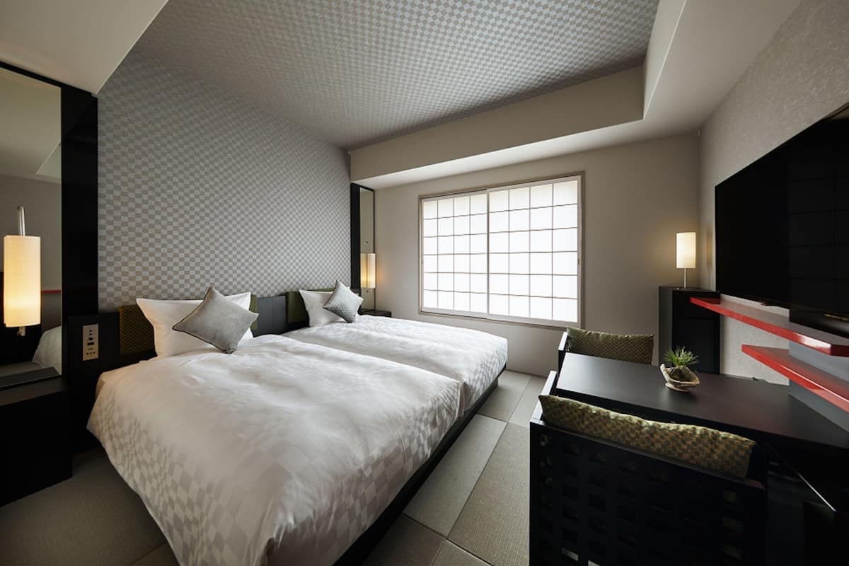 Laptop workspace, blackout curtains, soundproofing, iron/ironing board