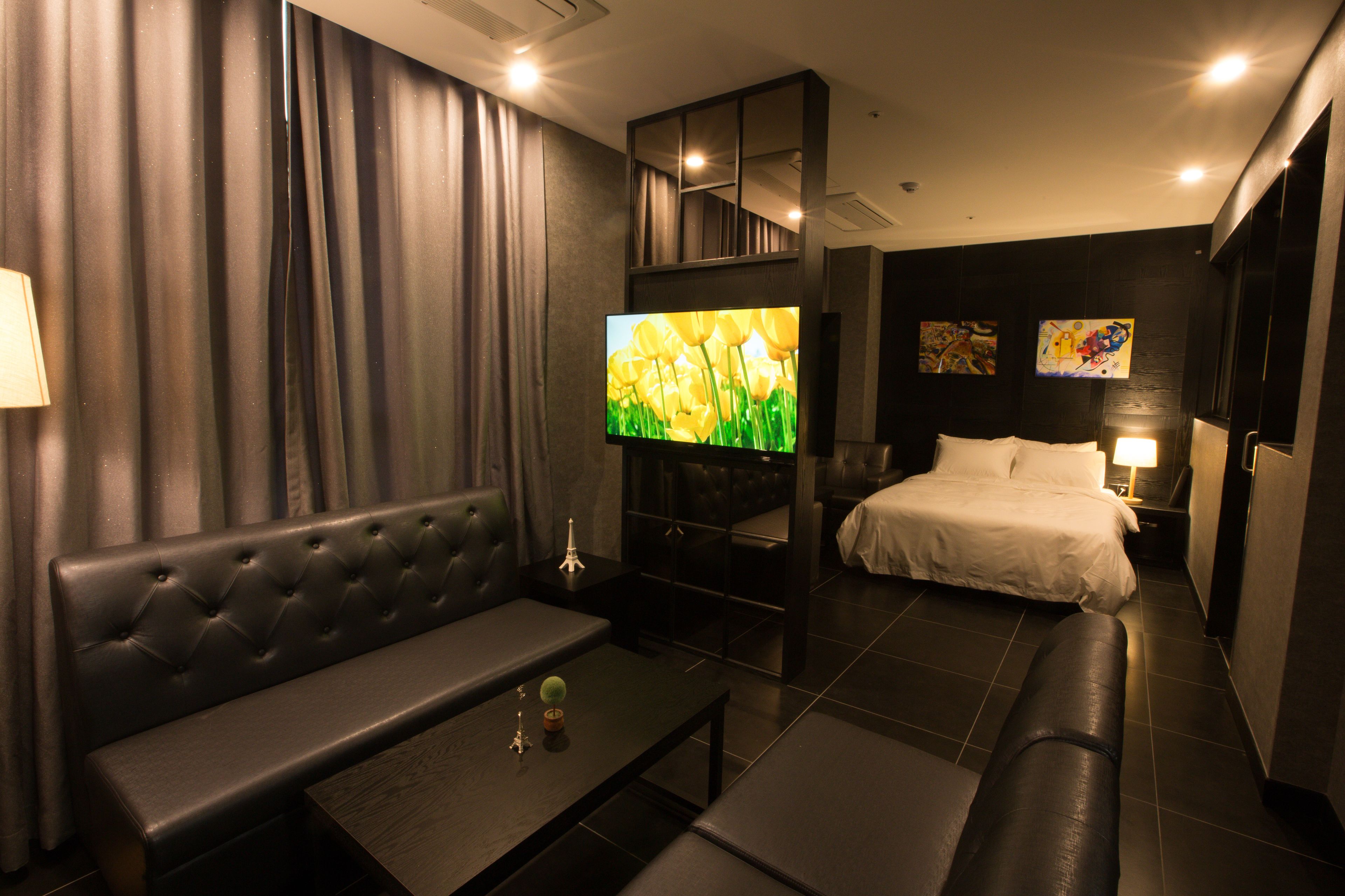 executive suite | individually decorated, desk, laptop workspace, blackout curtains