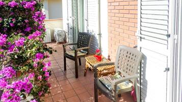 Habitación cuádruple clásica, habitaciones conectadas | Balcón