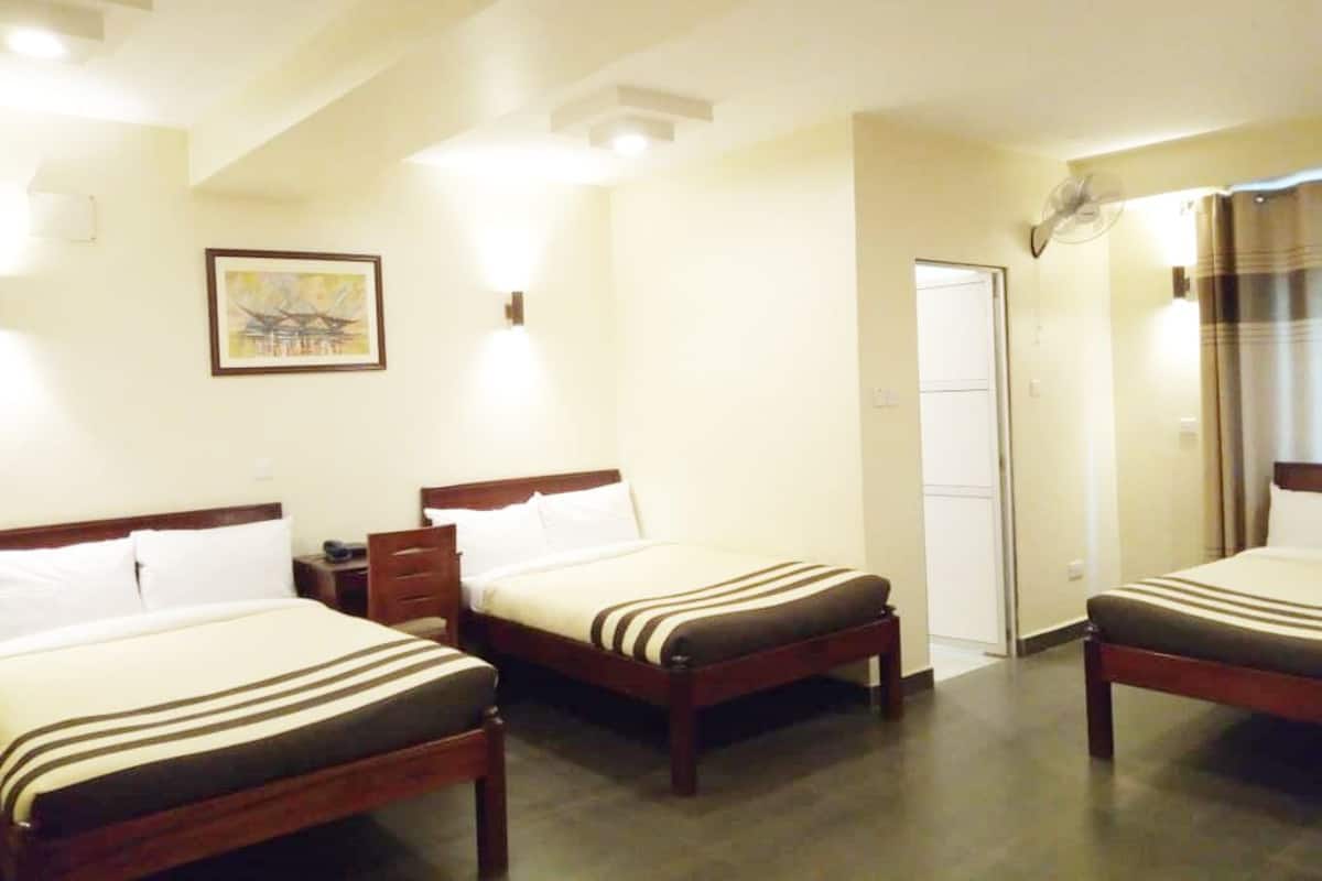 Deluxe Triple Room | Desk, WiFi (free), individually furnished