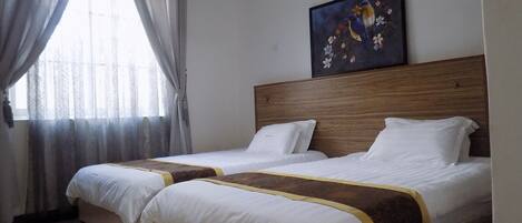 Kamar Twin | Meja kerja, Wi-Fi gratis, dan seprai linen