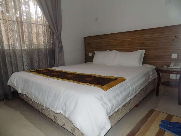 Habitación doble | Escritorio, wifi gratis y ropa de cama 