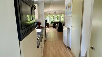 Deluxe Chalet, 2 Bedrooms | Private kitchen | Full-sized fridge, microwave, oven, stovetop