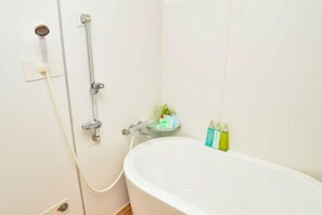 Habitación triple | Tina profunda