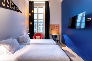 Luxe beddengoed, een bureau, geluiddichte muren, reisbedje