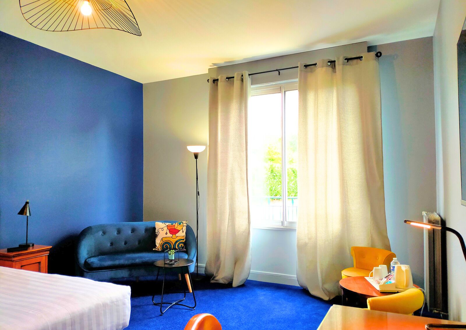 deluxe double room, 1 king bed, non smoking | individually decorated, desk, laptop workspace, blackout curtains