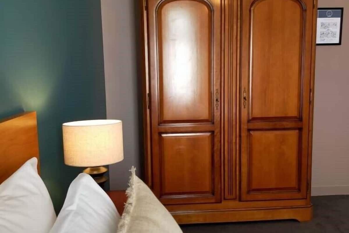 deluxe double room, 1 king bed, non smoking | individually decorated, desk, laptop workspace, blackout curtains