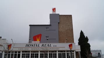 Hostal Real offers lodging, dining, and a cafe, with a bar and restaurant on site.