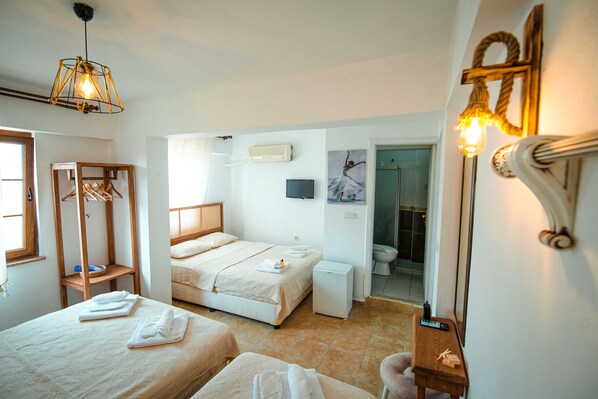 Family Room, Partial Sea View | Minibar, free WiFi, bed sheets - Eftelya Bozcaada (Bozcaada)