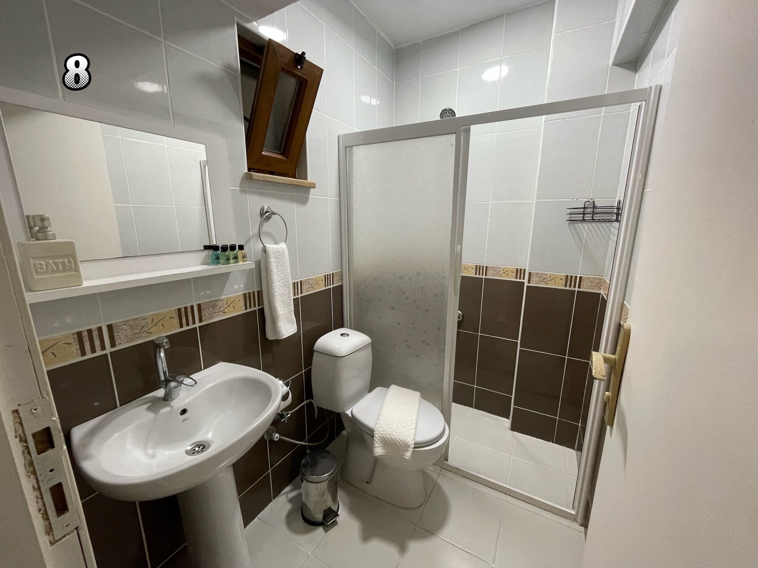 economy triple room (basement, no view) | bathroom | shower, free toiletries, hair dryer, slippers