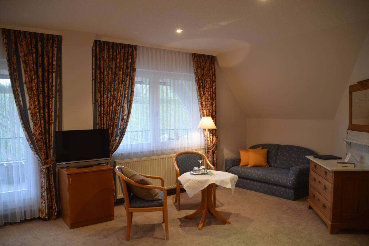 Dreibettzimmer | Wohnbereich