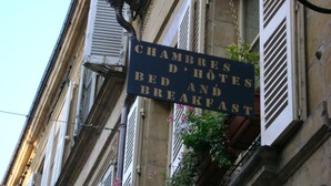 A sign for 'Chambres D'Hotes Bed and Breakfast' on a building facade. - Côté Chambres (Charleville-Mezieres)