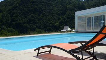 Seasonal outdoor pool, open 8:30 AM to 10:30 PM, sun loungers