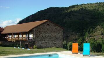 Seasonal outdoor pool, open 8:30 AM to 10:30 PM, sun loungers