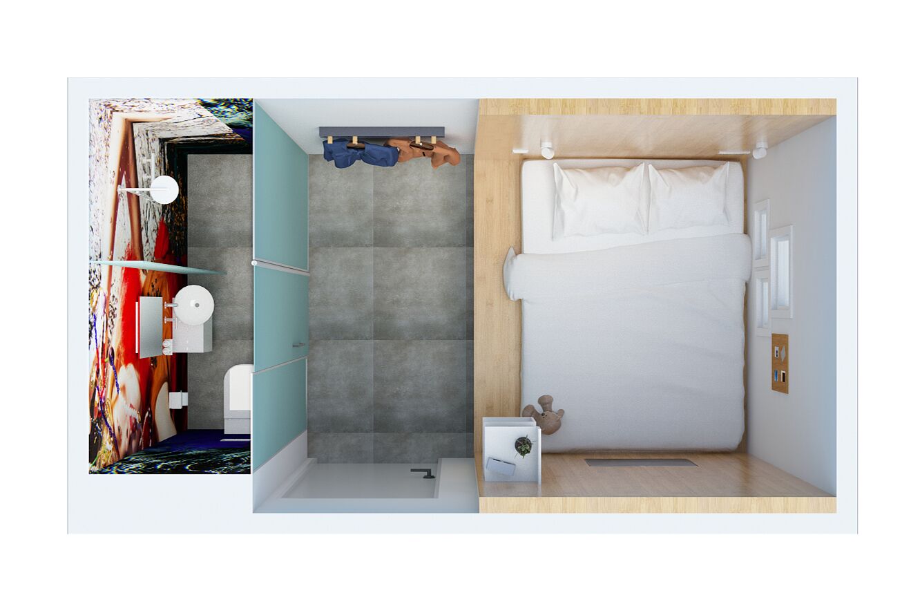 Ein Schlafzimmer mit Bett, Kleiderschrank und einem Badezimmer mit Dusche und Toilette.