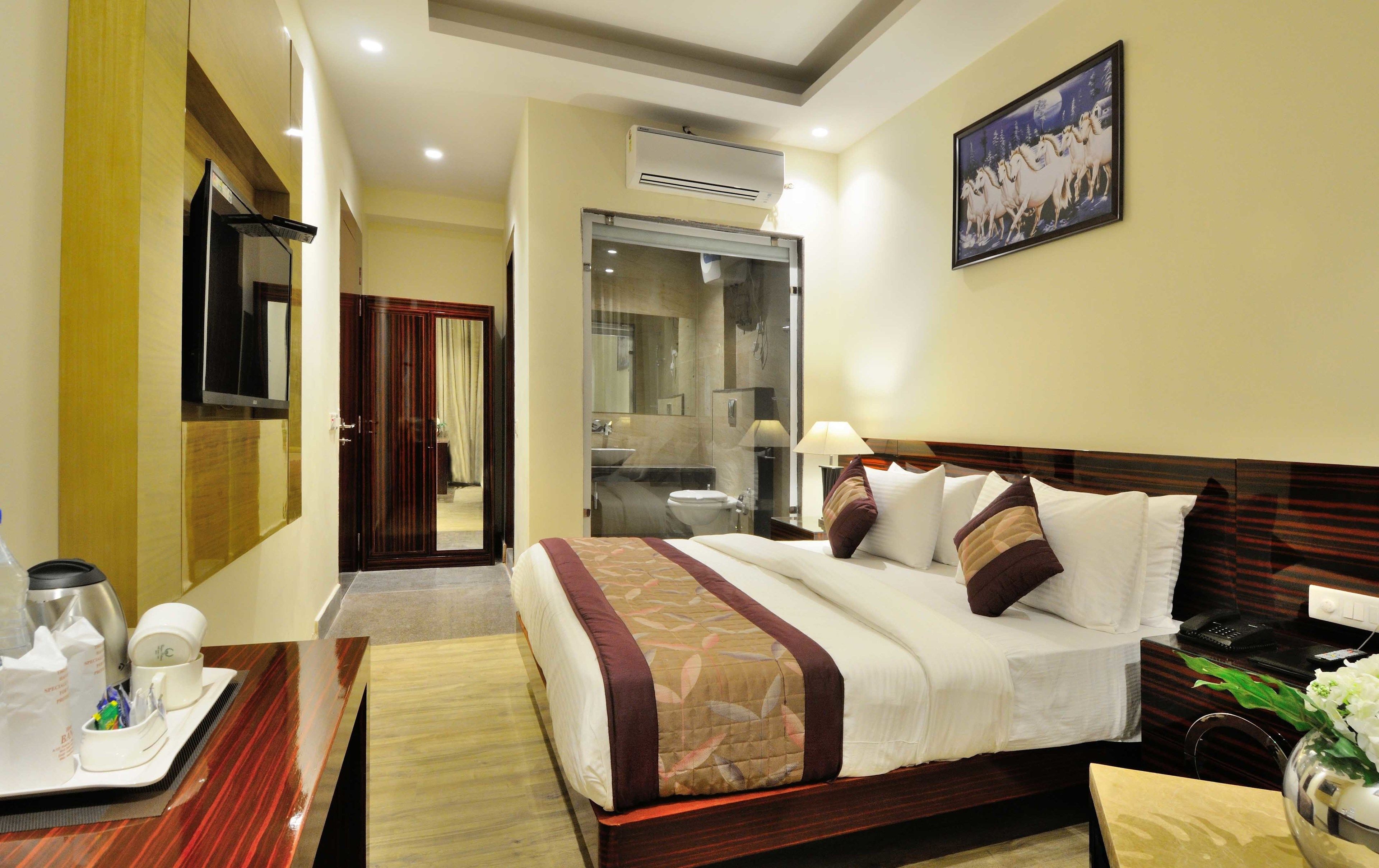 Habitación triple Deluxe (Standard room with free Wifi ) | Sábanas de algodón egipcio y ropa de cama de alta calidad