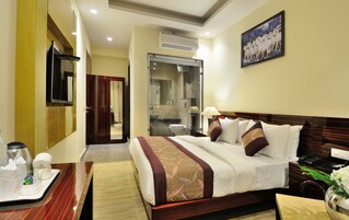 Deluxe-herbergi fyrir þrjá (Standard room with free Wifi ) | Rúmföt úr egypskri bómull, rúmföt af bestu gerð, dúnsængur