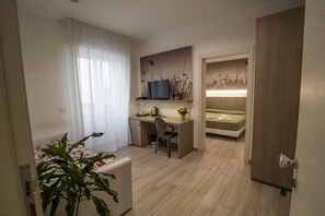 Family Suite, 2 Bedrooms | Egyptian cotton sheets, premium bedding, pillow-top beds, minibar - La Terrazza Sul Mare (Otranto)
