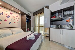 Apartment, 1 Queen Bed | Desk, free WiFi, bed sheets, wheelchair access - AppartaHotel (Beinasco)