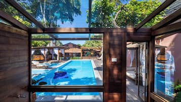 Outdoor pool, open 8:00 AM to 10:00 PM, pool umbrellas, pool loungers