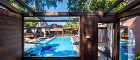 Outdoor pool, open 8:00 AM to 10:00 PM, pool umbrellas, pool loungers