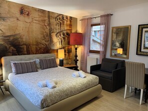 Deluxe Quadruple Room, City View | Iron/ironing board, free WiFi, bed sheets - B&B Albornoz (Urbino)