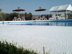 Seasonal outdoor pool, pool umbrellas, sun loungers