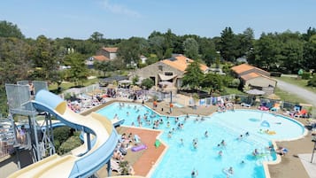Seasonal outdoor pool, open 9:00 AM to 8:00 PM, pool umbrellas