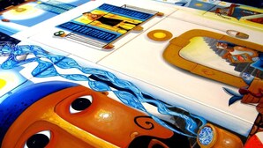 A board game with various colorful pieces and a detailed game board. - Ambra (Lipari)