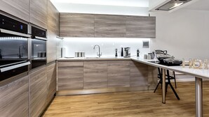 Suite Elite, 2 habitaciones, 2 baños, planta ejecutiva | 2 dormitorios, tabla de planchar con plancha, wifi gratis y ropa de cama
