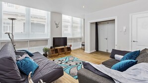 Suite Elite, 2 habitaciones, 2 baños, planta ejecutiva | 2 dormitorios, tabla de planchar con plancha, wifi gratis y ropa de cama
