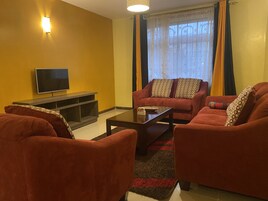 TV de tela plana, Netflix, filmes pagos