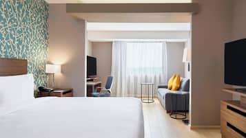 Suite, 1 cama King size | Ropa de cama de alta calidad y caja de seguridad en la habitación