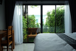 Habitación Deluxe doble, acceso a la piscina, planta baja | Wifi gratis y ropa de cama