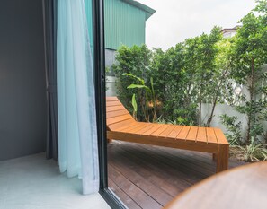 Habitación Deluxe doble, terraza, planta baja | Vistas al jardín