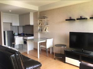 Studio Apartment | Coin séjour | Télévision à écran plat
