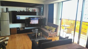 Studio Apartment with Sea View  | Living room | Flat-screen TV