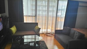 Studio Apartment with Sea View  | Living room | Flat-screen TV - Hua Hin Beach Rocco Condo by THR (Hua Hin)