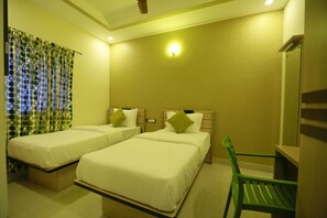 Chambre Deluxe avec lits jumeaux, 2 lits jumeaux | Literie de qualité, bureau, accès au Wi-Fi (inclus)