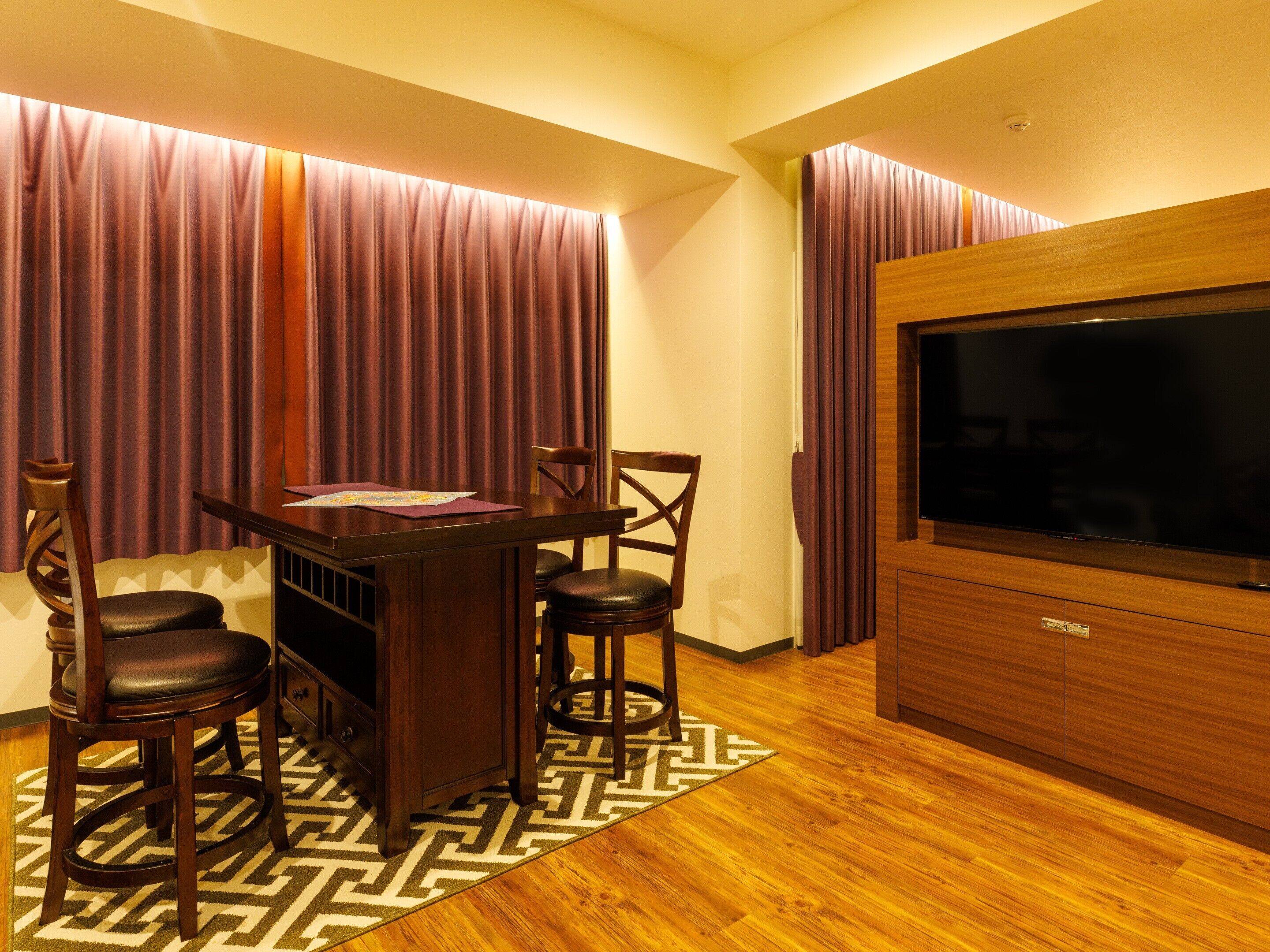 suite | in-room safe, desk, blackout curtains, iron/ironing board