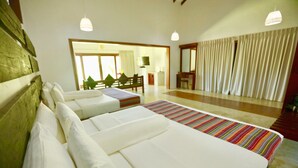 A hotel room with two beds, a large window, and a view of the outdoors. - Pinthaliya Resort & Spa (Avudangawa)