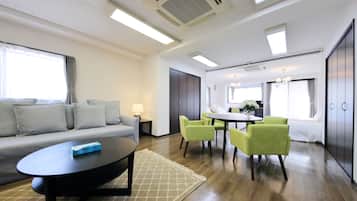 Apartamento luxo | Área de estar | TV de tela plana