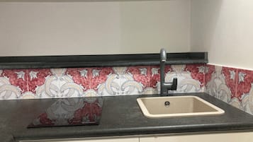 Apartamento, 1 quarto | Cozinha privada | Geladeira, cooktop, lava-louças, cafeteira/chaleira